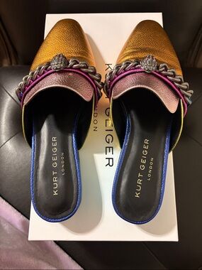 Kurt Geiger Metallic Gold Slip-On Mules with Multicolor Trim.